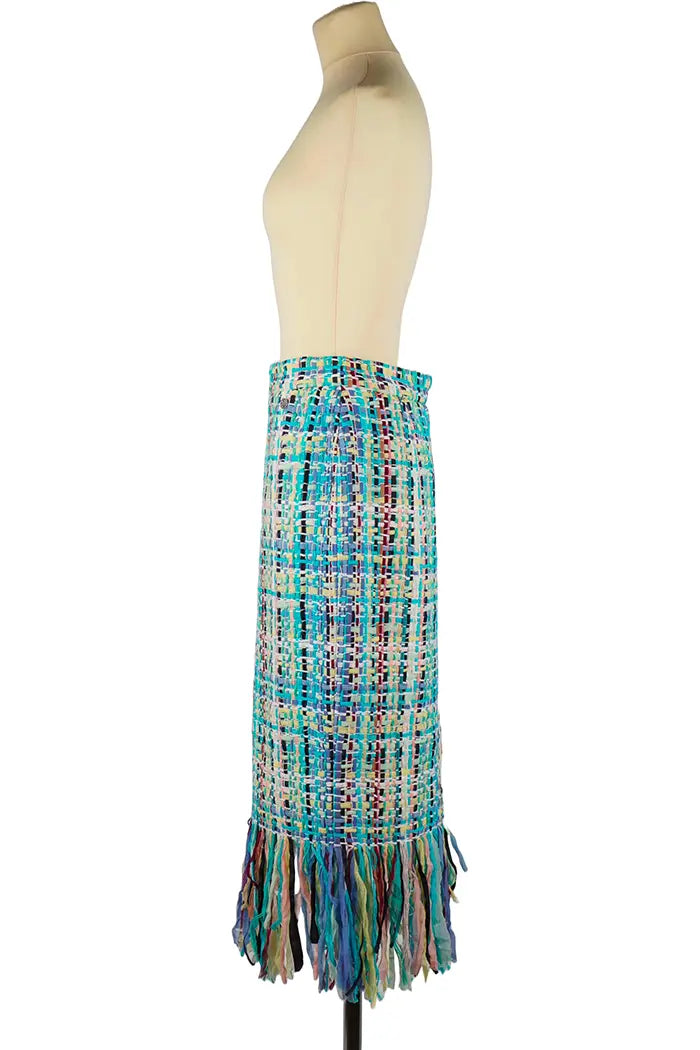 Falda Chanel con flecos en tweed multicolor, artículo de segunda mano, vista lateral