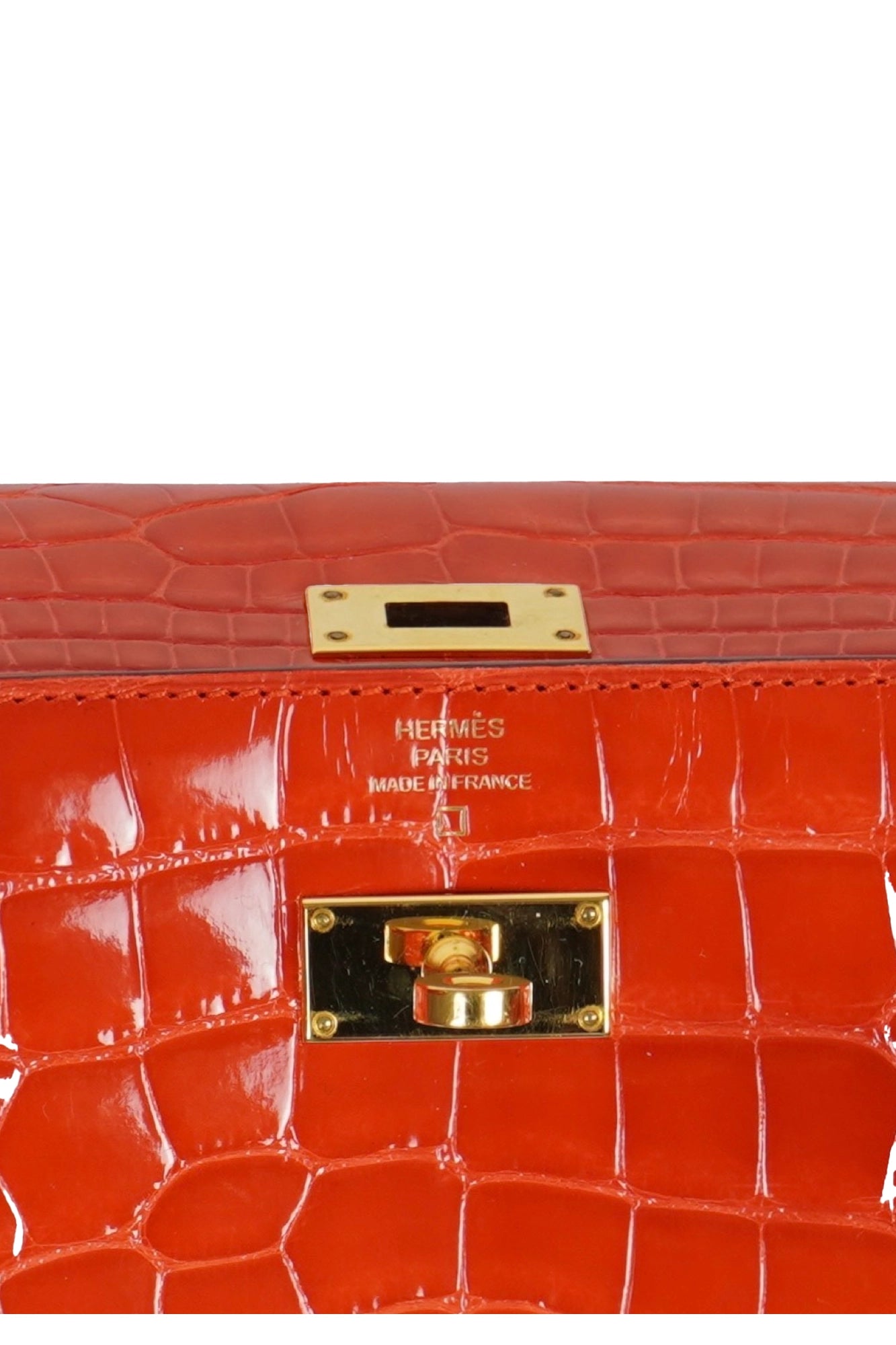 Cartera Hermes Kelly naranja en piel de aligátor, artículo de segunda mano, zoom sobre piel