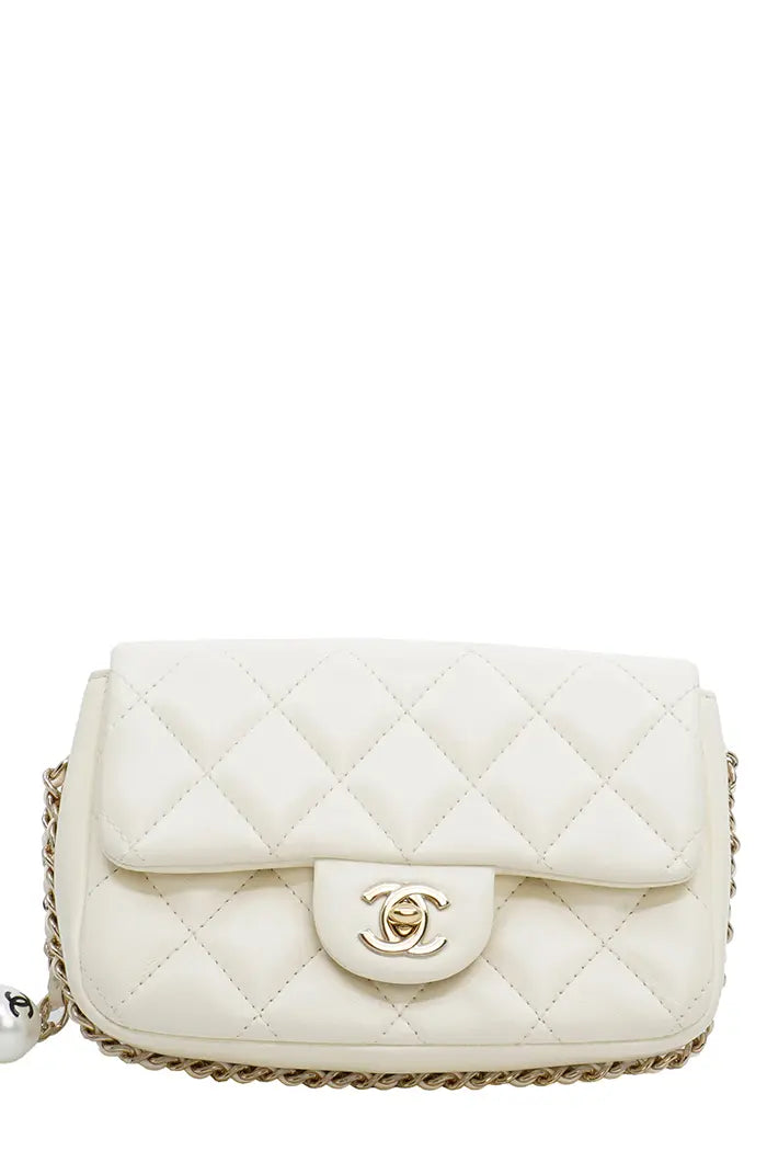 Chanel 'My Precious' white bag in lambskin with gold trim, pre-owned item, front view