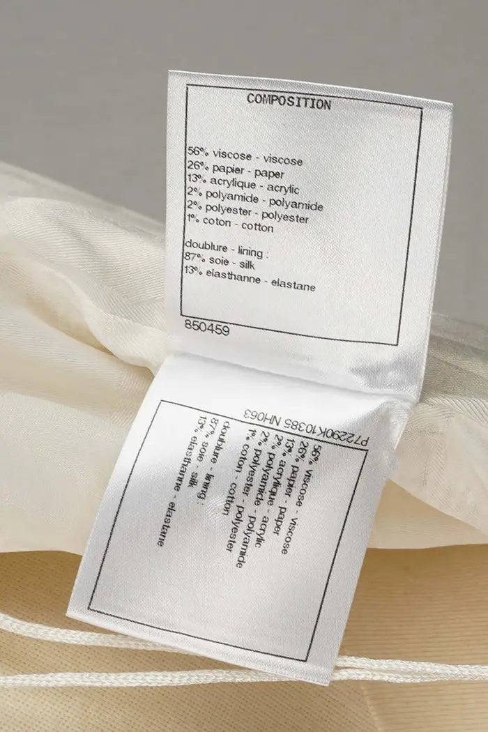 Chanel Tweedkleid, gebrauchter Artikel, Zoom auf das Etikett der Zusammensetzung