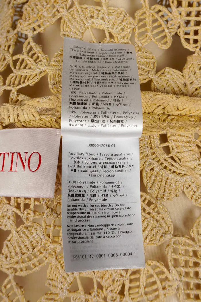 Veste-chemise Valentino Garavani ajourée beige : article d'occasion, zoom sur l'étiquette de composition