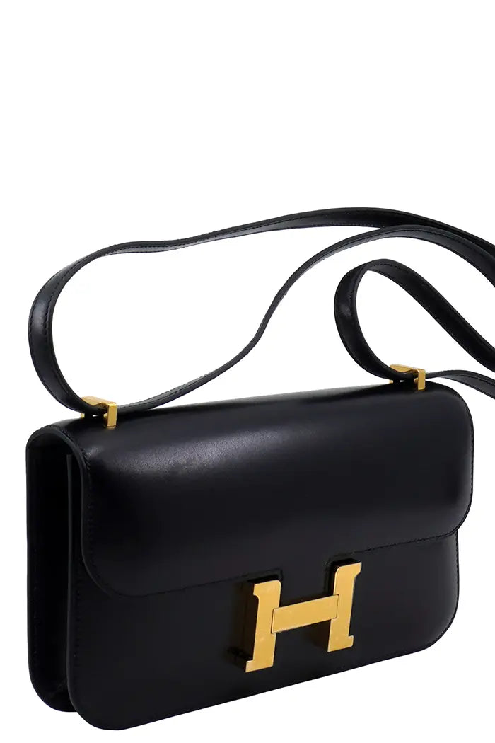 Used Constance Box Noir Hermès bag. Front right view.