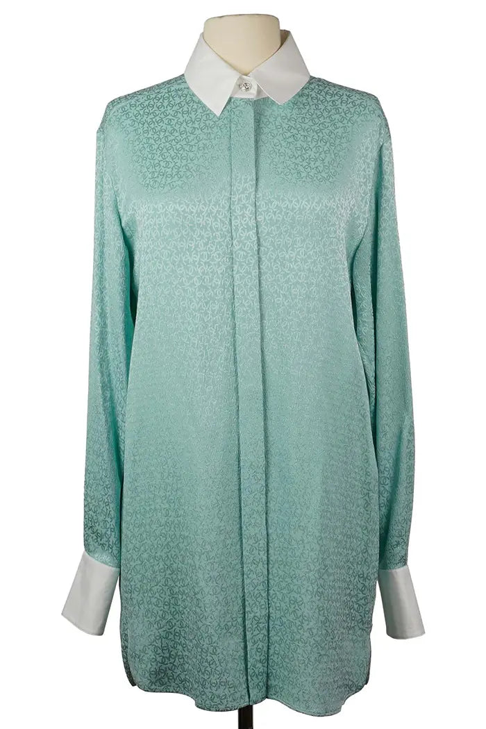 Chanel turquoise silk tunic with white collar and sleeves and shiny CC pattern buttons, front view
