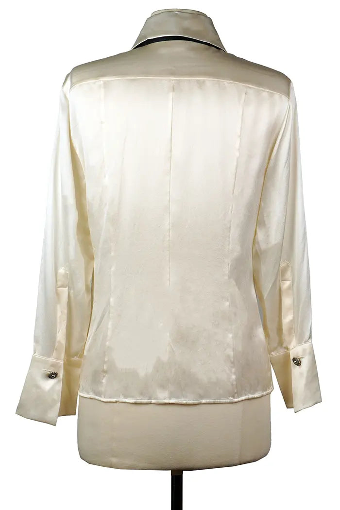 Rear view of Chanel preloved shirt, long sleeves and lightweight fabric.