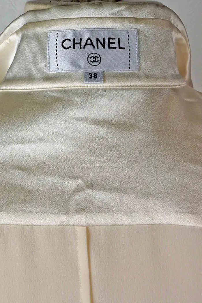Detail on Chanel label of blouse size 38fr