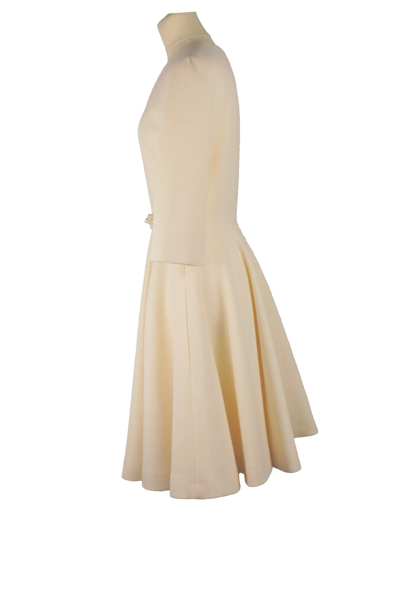 Left side view of Lanvin ivory dress on mannequin, elegant straight cut, structured fabric and refined silhouette, ideal for a dressy event.