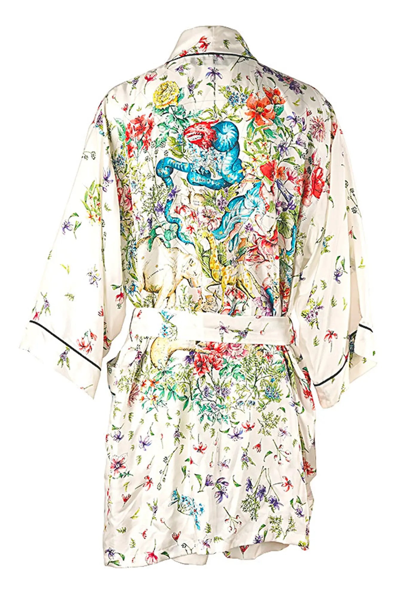 Back of Dior's silk kimono set, fluid, light silhouette, discreet celestial motif on the set for a sophisticated, casual look.