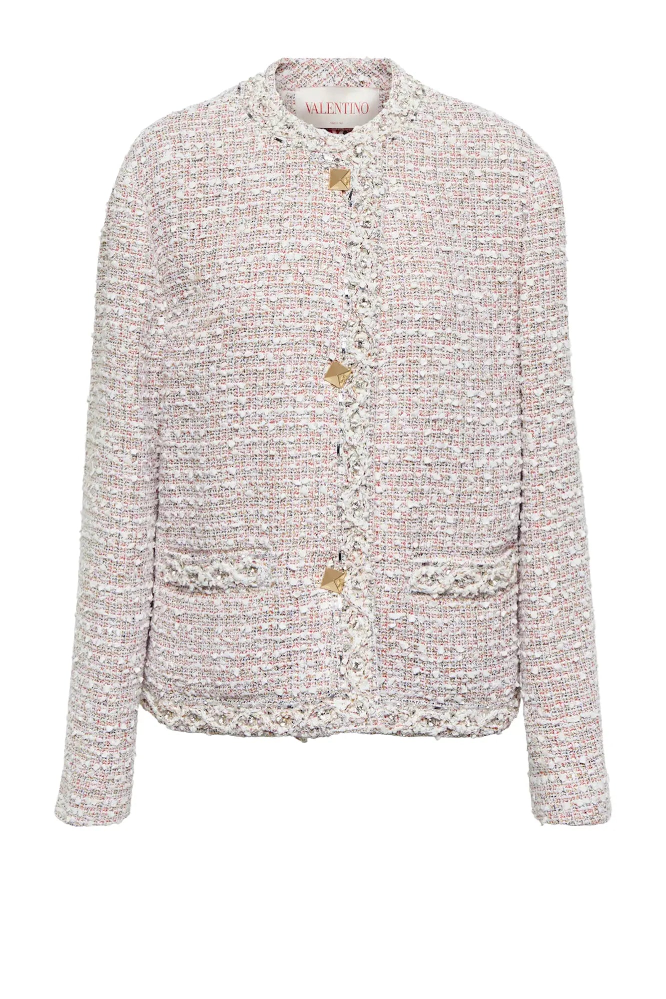 Veste Valentino en coton bouclé avec fibres métalliques sur mannequin, boutons Rockstud iconiques sur le devant pour une allure chic et éclat subtile.