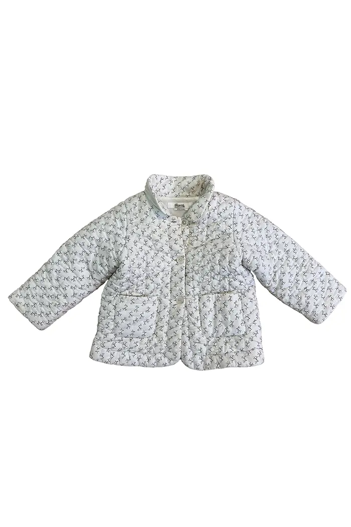 Veste Bonpoint d’occasion, face avant avec deux poches plaquées et boutons, imprimé floral blanc et bleu, taille 2 ans.