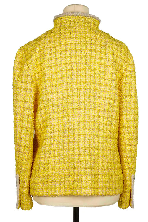 Back of Chanel summer jacket in bright yellow tweed, discreet lurex and straight cut, an elegant piece for cool summer days.