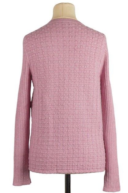 Back view of pink knitted cardigan Chanel. Ref. 1000018. Second hand Chanel, Reench.