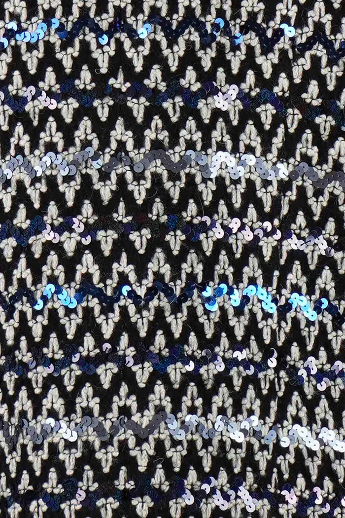 Chanel Chaqueta  en tweed de lentejuelas negro, artículo seminuevo, zoom en la tela en la parte trasera