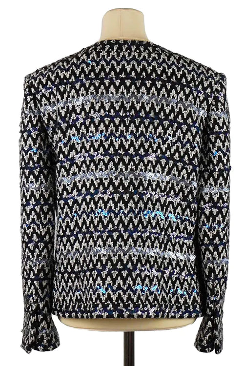 Chaqueta Chanel en tweed negro adornado con lentejuelas, elegante corte recto para un look sofisticado en talla 40 FR.