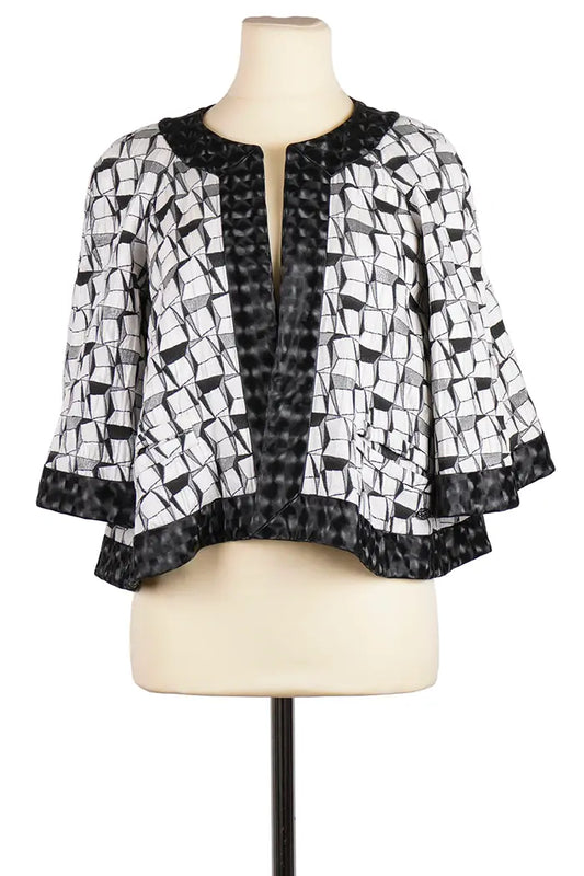 Chaqueta Chanel de algodón blanco y negro, artículo de segunda mano, vista frontal