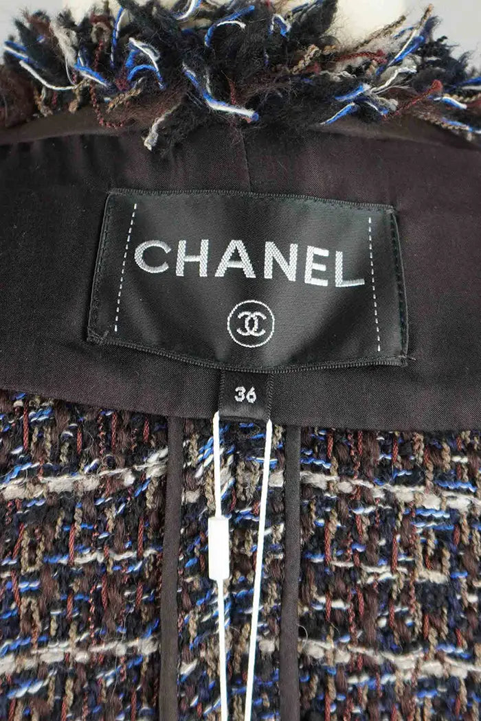 Chanel abrigo largo con flecos Tweed, artículo de segunda mano, zoom en la etiqueta Chanel