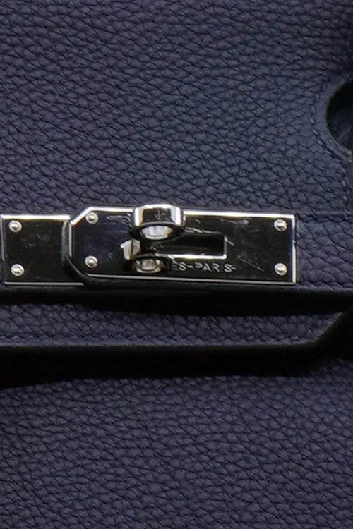 Hermès Birkin 30 leather bag Togo navy blue, pre-owned item, zoom on the silver clasp