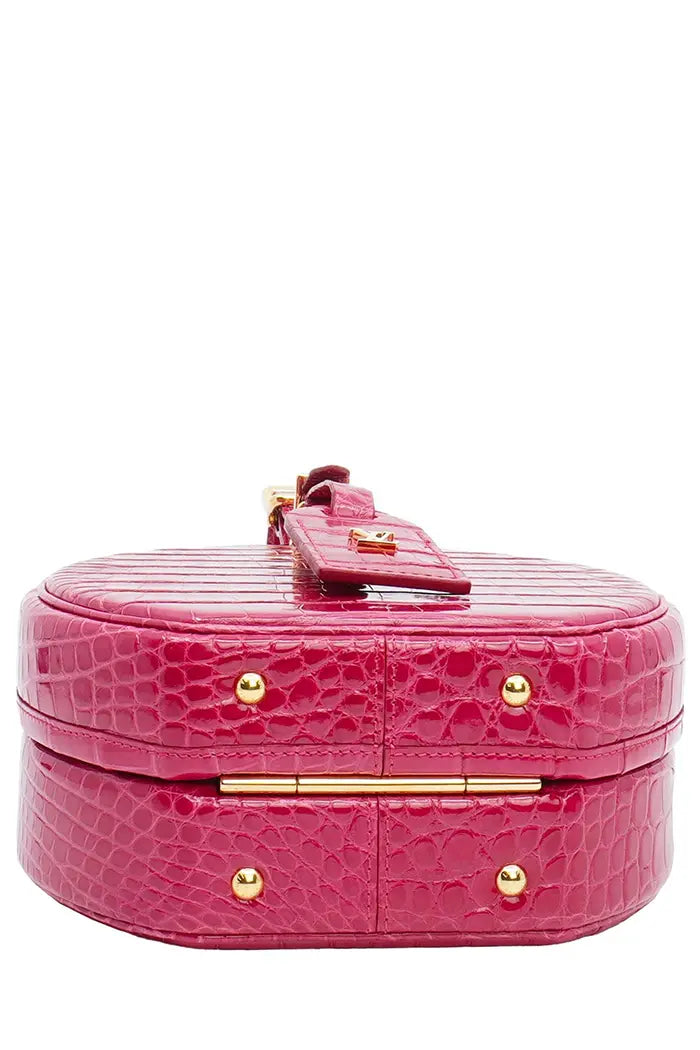 Sac Louis Vuitton 'Petite Boite Chapeau'  rose en cuir d'alligator, article d'occasion, vue de dessous