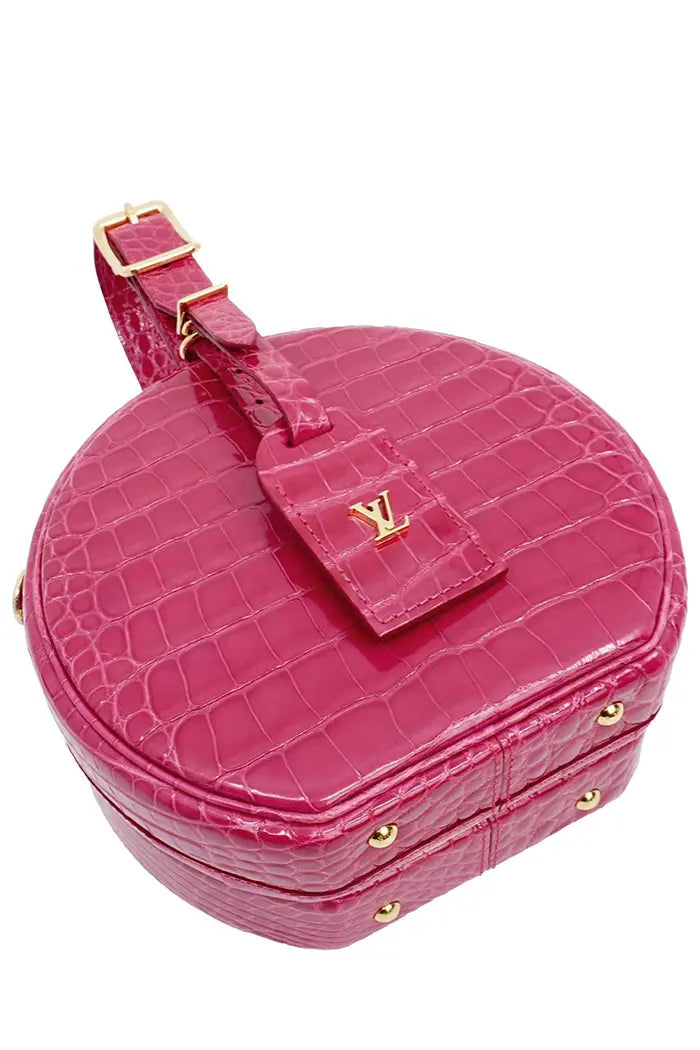Sac Louis Vuitton 'Petite Boite Chapeau'  rose en cuir d'alligator, article d'occasion, vue de 3/4