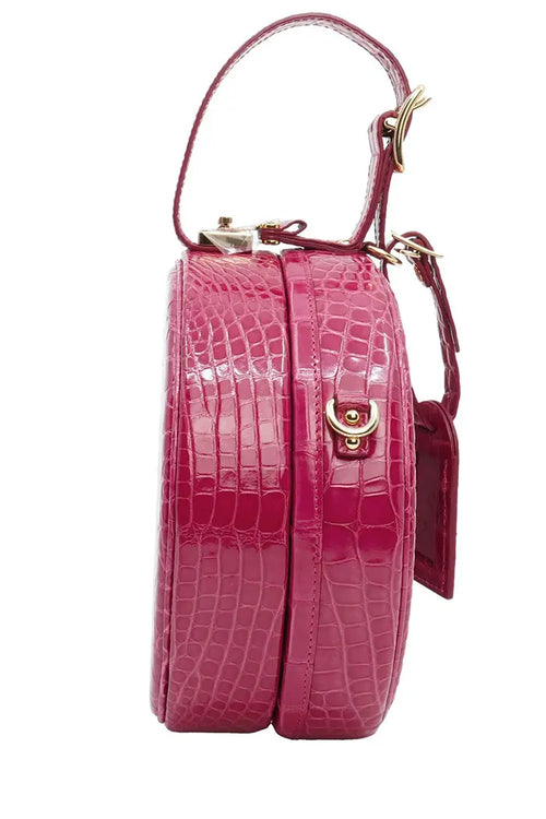 Sac Louis Vuitton 'Petite Boite Chapeau'  rose en cuir d'alligator, article d'occasion, vue de côté