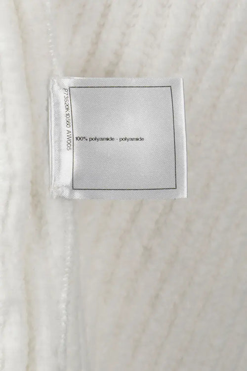 Chanel white cardigan, Fall/Winter 2022 collection, zoom on composition label