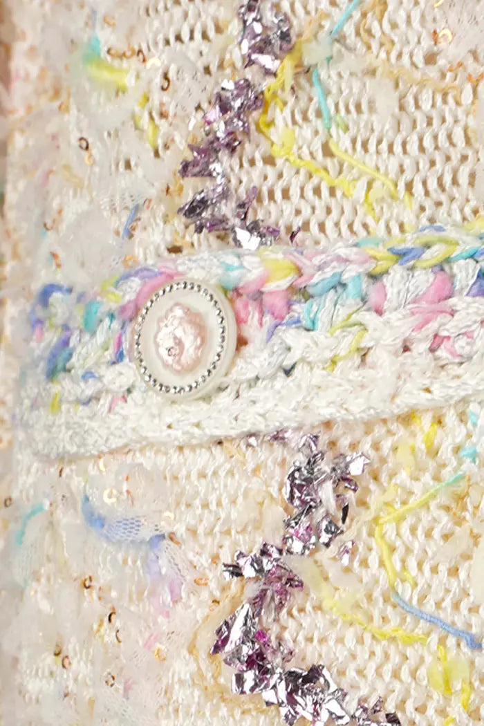Chanel tweed pastel Cardigan , spring/summer 2022 collection, pre-owned item, zoom on button