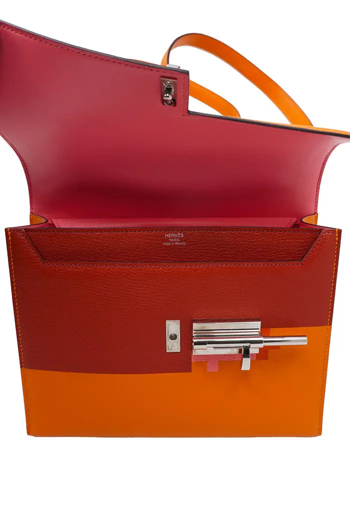 Hermes Verrou bag in orange Epsom leather, pre-owned item, view of open bag showing 3 colors: orange, pink and red
