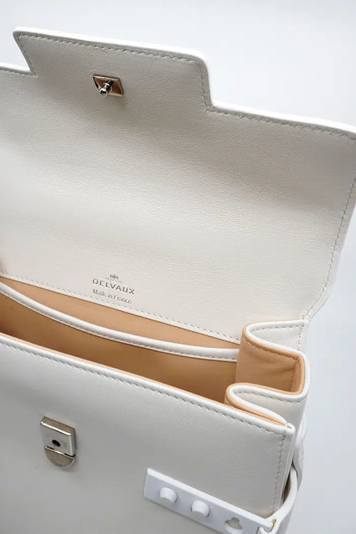 Bolso Delvaux Tempête en piel de becerro crujiente color marfil, artículo usado, otra vista del bolso abierto
