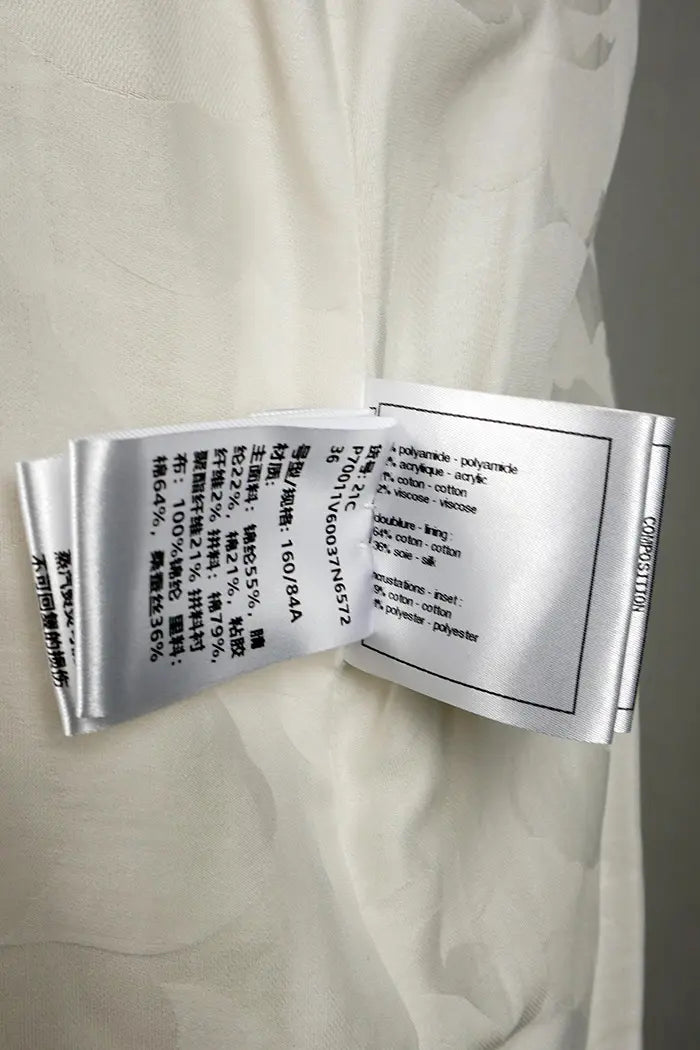 Chanel tweed and white lace shirt-dress, Paris-Capri Resort, pre-owned item, zoom on composition label