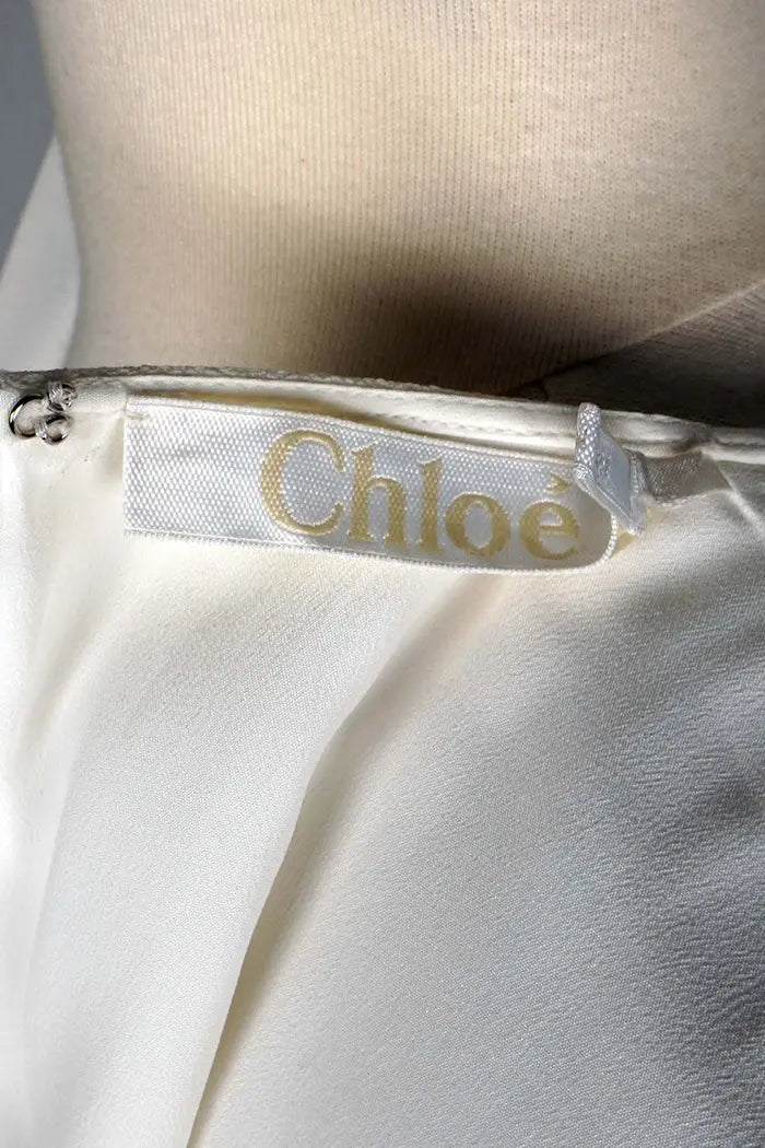 Vestido blanca Chloé de largo medio, artículo de segunda mano, zoom en la etiqueta
