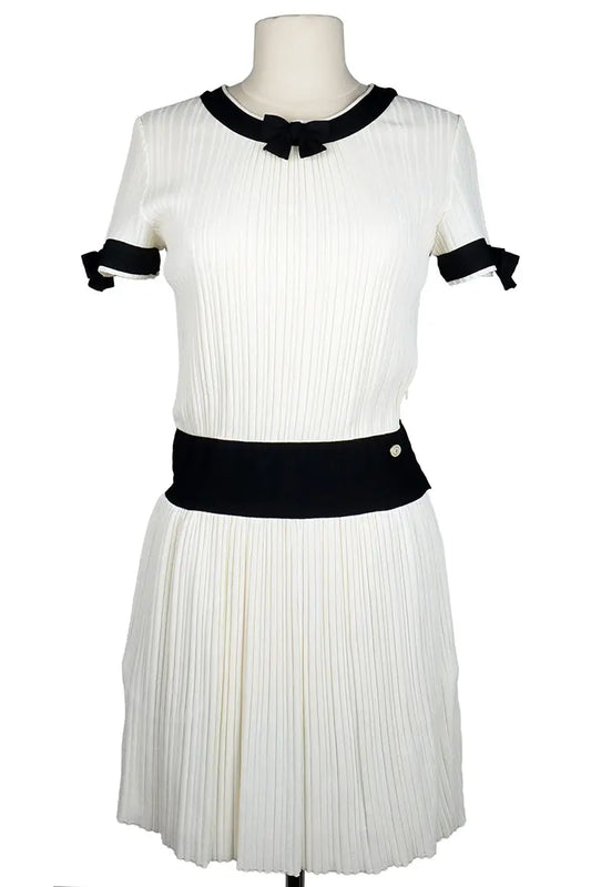 Kleid Chanel cremefarben mit schwarzen Akzenten und Fliege, gebrauchter Artikel, Vorderansicht