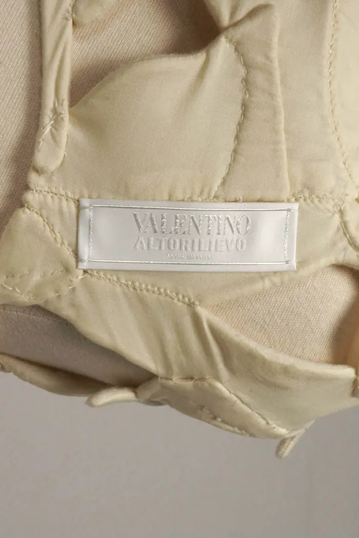 Valentino – Durchbrochener Umhang aus weißer Schurwolle und Kaschmir, gebrauchter Artikel, Zoom auf das Etikett