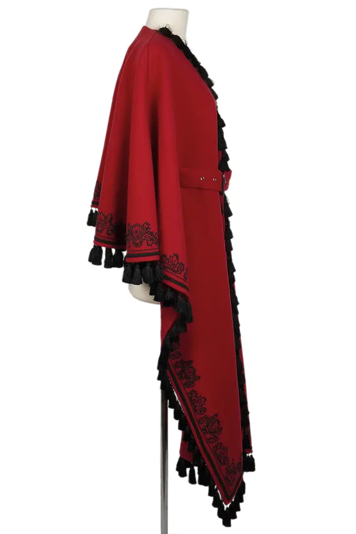 Chal Dior de lana virgen roja y flecos negros, artículo de ocasión, zoom sobre la etiqueta Christian Dior, vista lateral