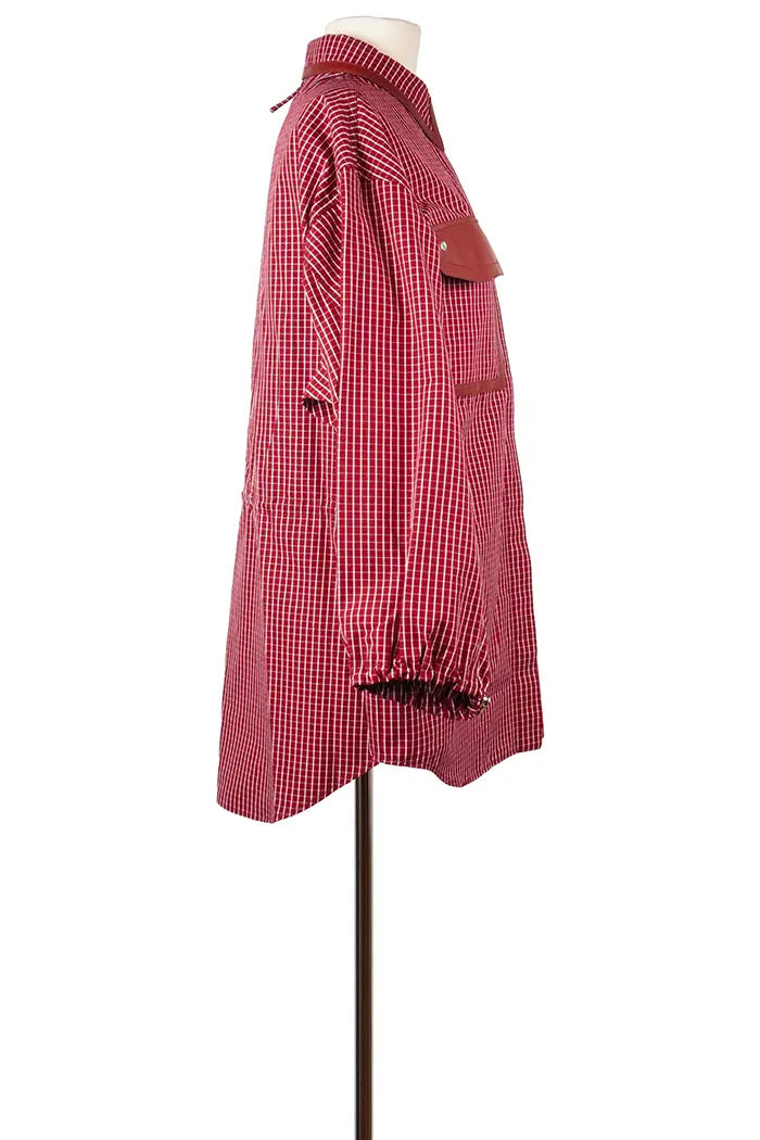 Sur-chemise Hermès 100 % coton, à carreaux rouges, article d'occasion, vue de côté