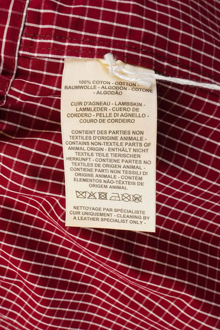 Sur-chemise Hermès 100 % coton, à carreaux rouges, article d'occasion, zoom sur l'étiquette de composition