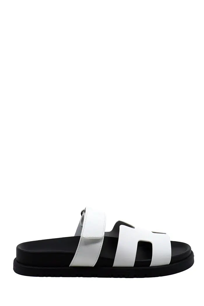 Hermès Chypre white leather sandals, side view. New, used.