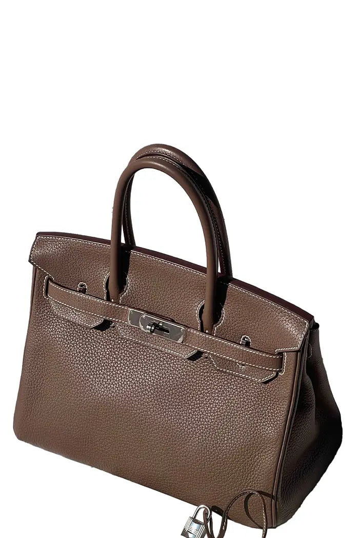 Hermès Birkin 30 d'occasion en couleur Étoupe Retourné en cuir Epsom avec finitions Palladium. Certifié authentique, en très bon état.