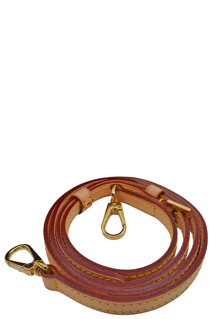 Close-up of the removable leather shoulder strap on the Twisted Box preloved bag, in good condition. 